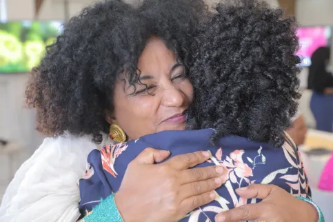 Two African women hugging