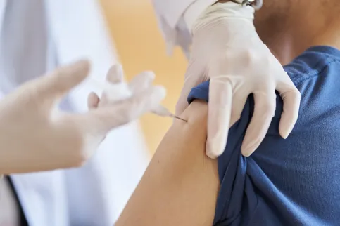 Close up of a patient receiving an injection